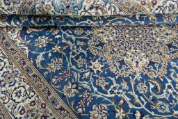 Close-up detail of 2000s Nain rug from Iran / Persia showing Wool weave