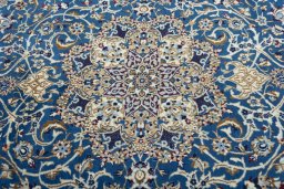 Central medallion detail of 2000s Nain rug from Iran / Persia