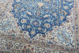 Close-up detail of 2000s Nain rug from Iran / Persia showing Wool weave