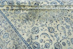 Close-up detail of New Nain rug from Iran / Persia showing Wool weave