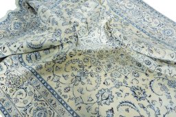 Surface texture of New Nain rug with natural Wool and intricate pattern