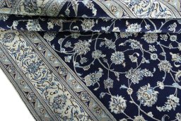 Close-up detail of 2000s Nain rug from Iran / Persia showing Wool weave