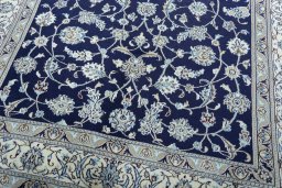 Close-up detail of 2000s Nain rug from Iran / Persia showing Wool weave
