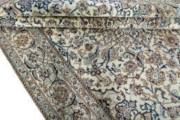 Close-up detail of 2000s Nain rug from Iran / Persia showing Wool weave