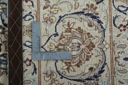Backside of handmade 2000s Nain rug showing knot structure and weave density