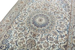Backside of handmade 2000s Nain rug showing knot structure and weave density