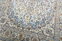 Close-up detail of 2000s Nain rug from Iran / Persia showing Wool weave