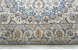 Full view of 2000s Nain rug from Iran / Persia, 315 × 202 cm in Beige tones
