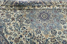 Close-up detail of 2000s Nain rug from Iran / Persia showing Wool weave