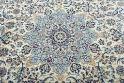 Central medallion detail of 2000s Nain rug from Iran / Persia