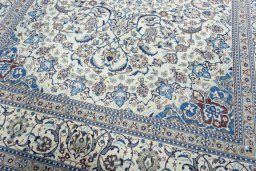 Close-up detail of 2000s Nain rug from Iran / Persia showing Wool weave