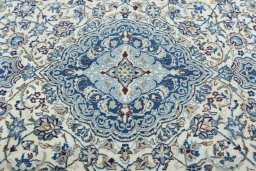 Central medallion detail of 2000s Nain rug from Iran / Persia