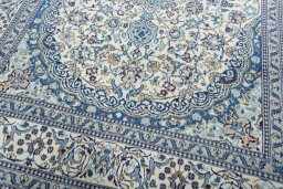 Close-up detail of 2000s Nain rug from Iran / Persia showing Wool weave