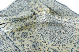 Surface texture of New Nain rug with natural Wool and intricate pattern