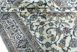 Close-up detail of 2000s Nain rug from Iran / Persia showing Wool weave