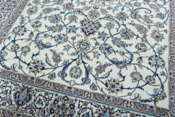 Close-up detail of 2000s Nain rug from Iran / Persia showing Wool weave