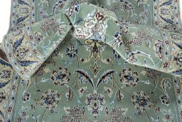 Close-up detail of New Nain rug from Iran / Persia showing Wool weave