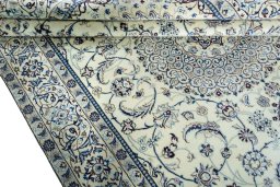 Close-up detail of 2000s Nain rug from Iran / Persia showing Wool weave
