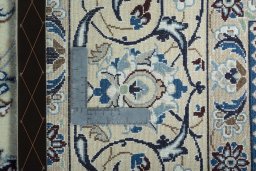 Backside of handmade 2000s Nain rug showing knot structure and weave density