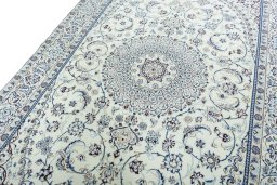 Backside of handmade 2000s Nain rug showing knot structure and weave density