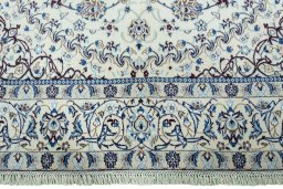 Full view of 2000s Nain rug from Iran / Persia, 311 × 200 cm in Beige tones