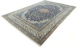 Corner detail of 2000s Nain rug showing border pattern and Wool pile