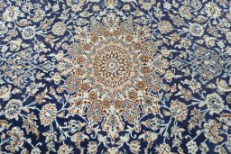 Central medallion detail of 2000s Nain rug from Iran / Persia