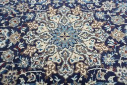 Central medallion detail of 2000s Nain rug from Iran / Persia