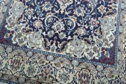 Close-up detail of 2000s Nain rug from Iran / Persia showing Wool weave