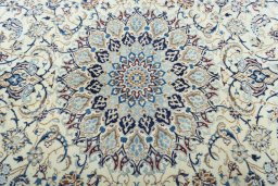 Central medallion detail of 2000s Nain rug from Iran / Persia