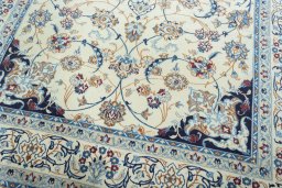 Close-up detail of 2000s Nain rug from Iran / Persia showing Wool weave