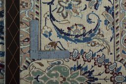 Backside of handmade 2000s Nain rug showing knot structure and weave density