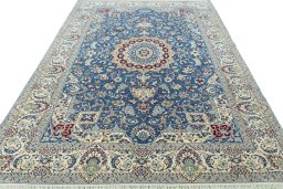 Surface texture of 2000s Nain rug with natural Wool and intricate pattern