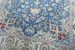 Close-up detail of 2000s Nain rug from Iran / Persia showing Wool weave