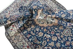 Surface texture of 2000s Nain rug with natural Wool and intricate pattern
