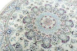 Surface texture of New Nain rug with natural Wool and intricate pattern