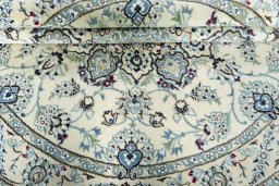 Close-up detail of New Nain rug from Iran / Persia showing Wool weave