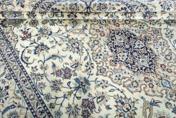 Close-up detail of New Nain rug from Iran / Persia showing Wool weave