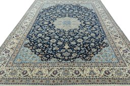 Surface texture of 2000s Nain rug with natural Wool and intricate pattern