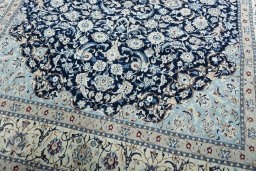 Close-up detail of 2000s Nain rug from Iran / Persia showing Wool weave