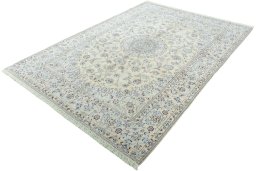 Corner detail of 2000s Nain rug showing border pattern and Wool pile