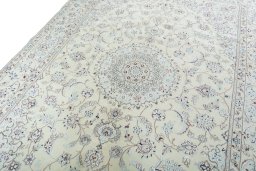 Backside of handmade 2000s Nain rug showing knot structure and weave density