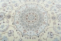 Central medallion detail of 2000s Nain rug from Iran / Persia