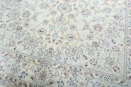 Close-up detail of 2000s Nain rug from Iran / Persia showing Wool weave