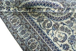 Close-up detail of New Nain rug from Iran / Persia showing Wool weave