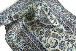 Surface texture of New Nain rug with natural Wool and intricate pattern