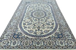 Surface texture of New Nain rug with natural Wool and intricate pattern