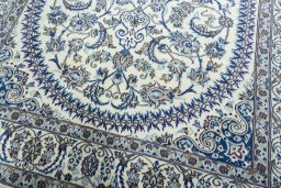Close-up detail of New Nain rug from Iran / Persia showing Wool weave