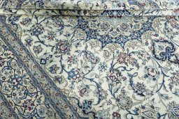 Close-up detail of 2000s Nain rug from Iran / Persia showing Wool weave