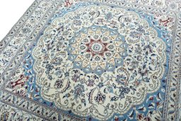 Backside of handmade 1970s Nain rug showing knot structure and weave density